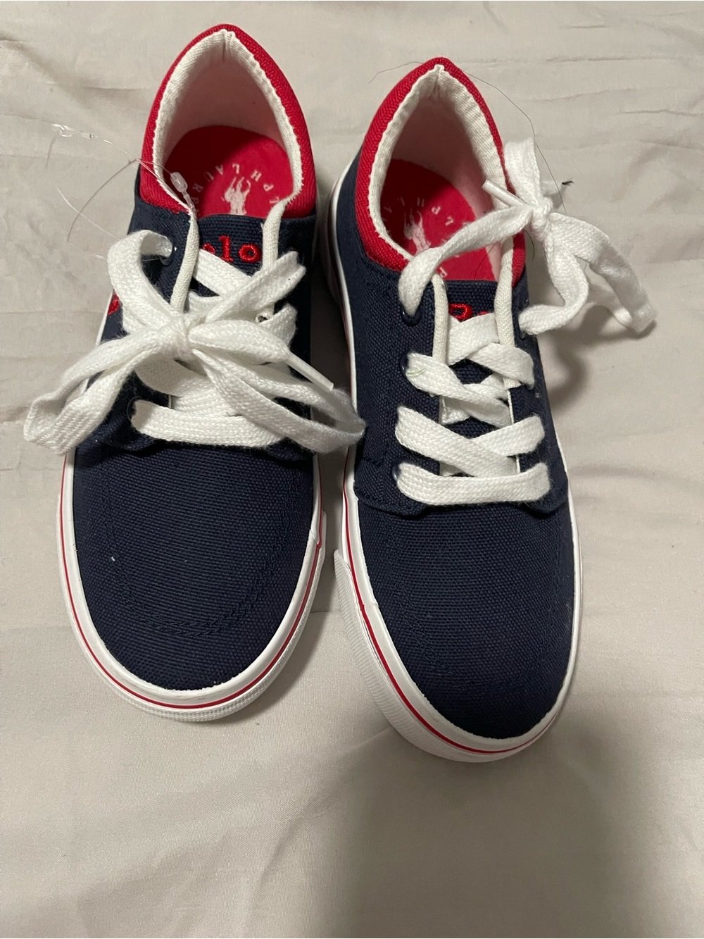 Polo Ralph Lauren Kid’s Navy Canvas Sneakers with Red Trim and White Laces